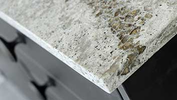 A close up of the granite counter top