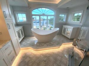 A large bathroom with a tub and sink