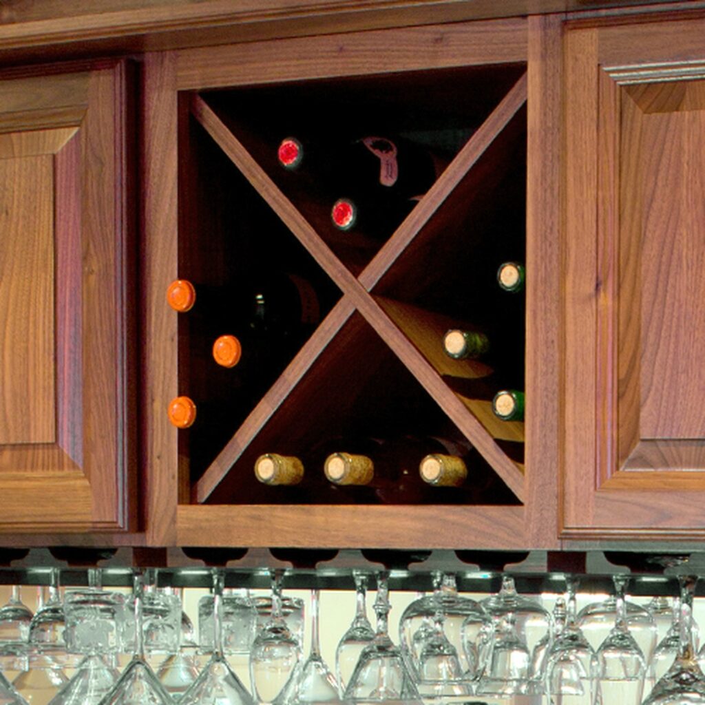 A wine rack with many bottles of wine in it