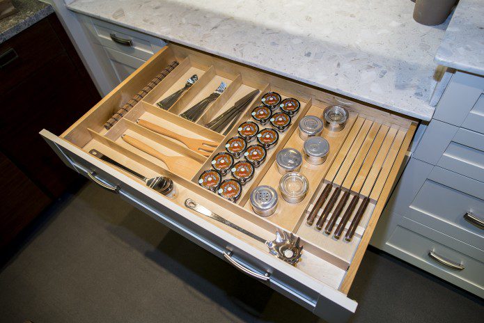 A drawer with many different tools on it
