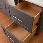 A close up of an open drawer in a kitchen.